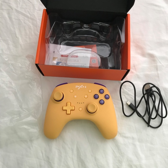 PXN 9607X Wireless Gaming Controller For Nintendo Switch PC IOS Yellow Purple - Picture 1 of 9